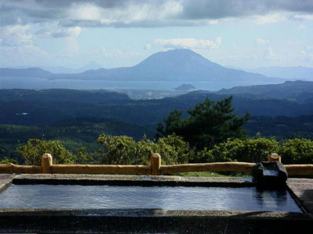 Отель Kirishima Onsen Ryokojin Sanso Экстерьер фото