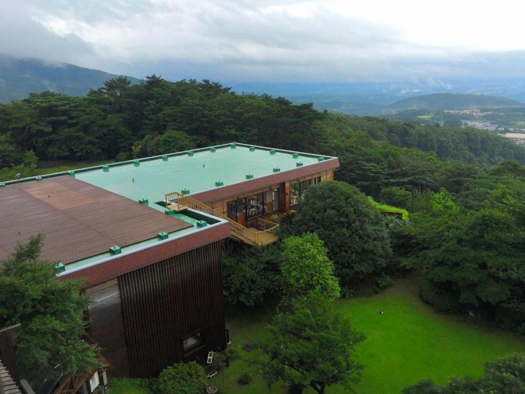 Отель Kirishima Onsen Ryokojin Sanso Экстерьер фото