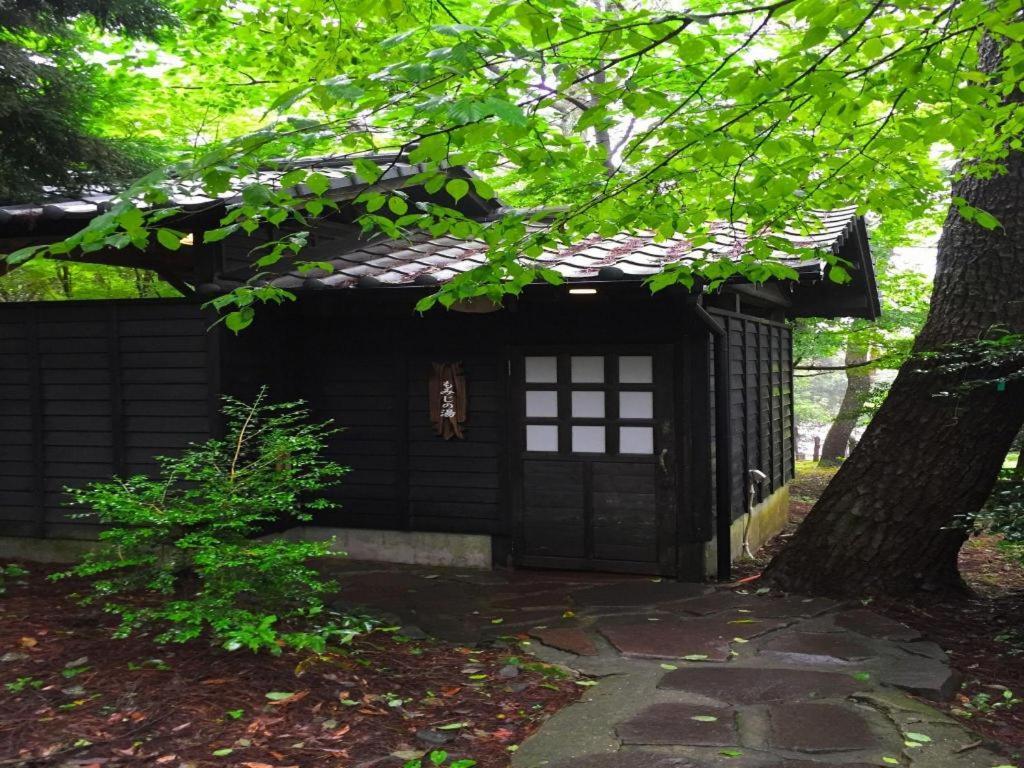 Отель Kirishima Onsen Ryokojin Sanso Экстерьер фото