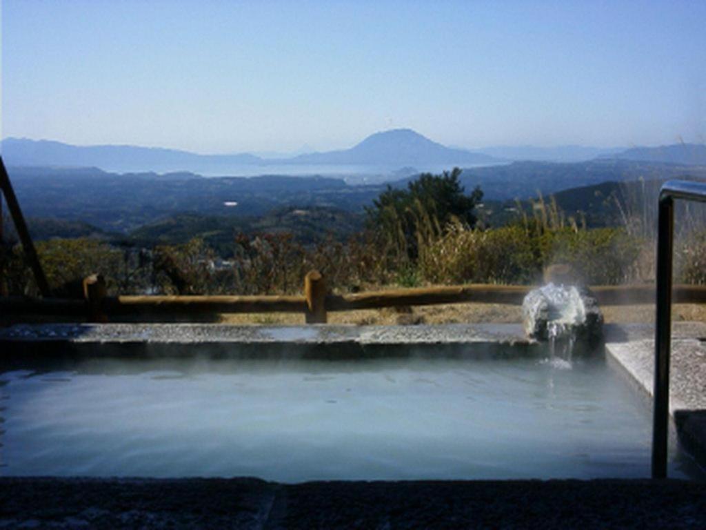 Отель Kirishima Onsen Ryokojin Sanso Экстерьер фото