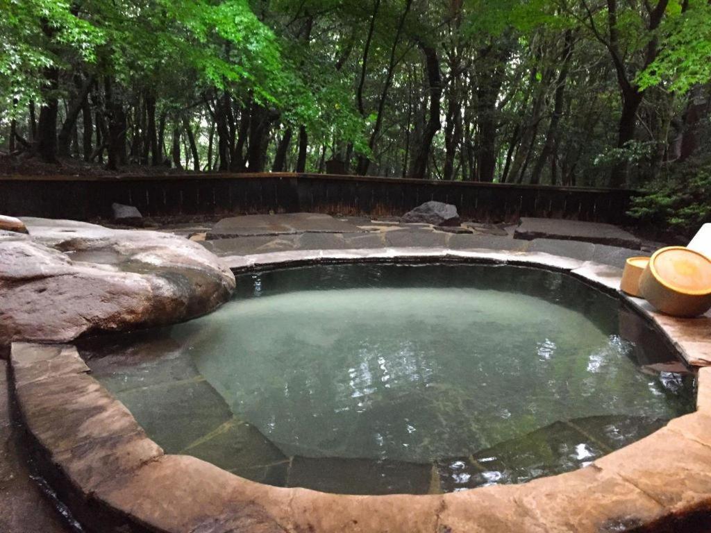 Отель Kirishima Onsen Ryokojin Sanso Экстерьер фото